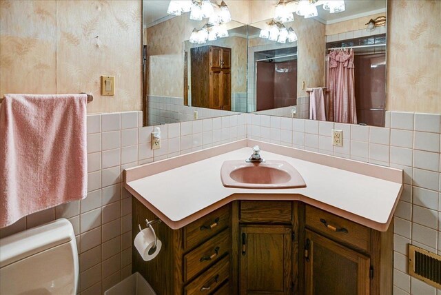 2809 Dewey Ct, Middleton, WI 53562 - bathroom featuring toilet, curtained shower, vanity, visible vents, and tile walls