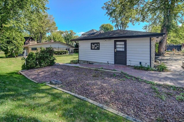 2809 Dewey Ct, Middleton, WI 53562 - exterior space with an outdoor structure and a yard