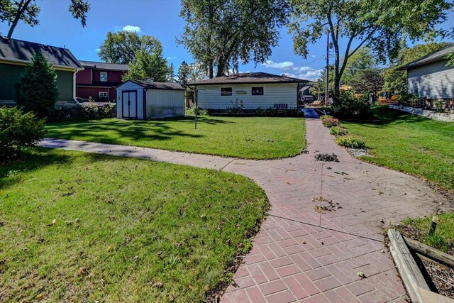 2809 Dewey Ct, Middleton, WI 53562 - view of yard with an outbuilding and a storage unit