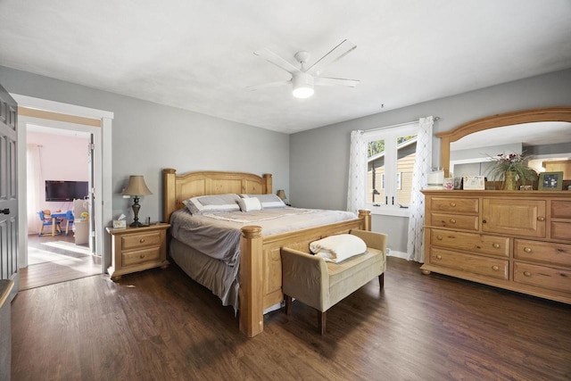 bedroom with ceiling fan and dark wood-type flooring