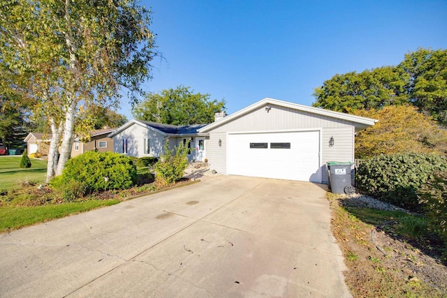 ranch-style home with a garage