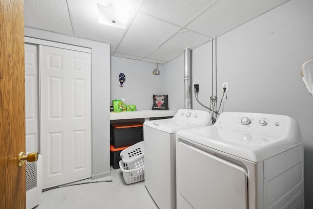 laundry area with washing machine and clothes dryer