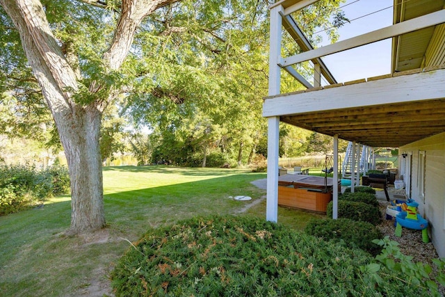 view of yard featuring a wooden deck