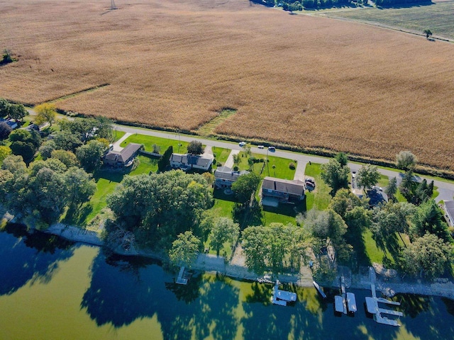 bird's eye view with a rural view and a water view