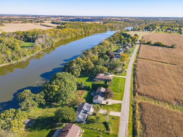 drone / aerial view with a rural view and a water view