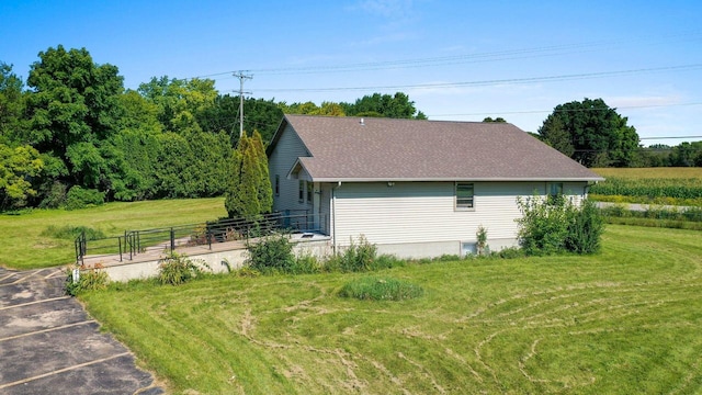 view of property exterior featuring a yard