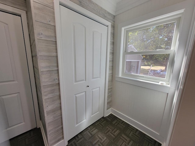 doorway featuring dark parquet floors