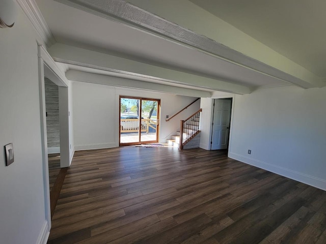 unfurnished living room with crown molding and dark hardwood / wood-style flooring