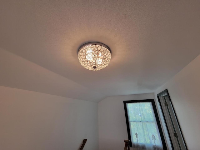 interior details featuring a textured ceiling