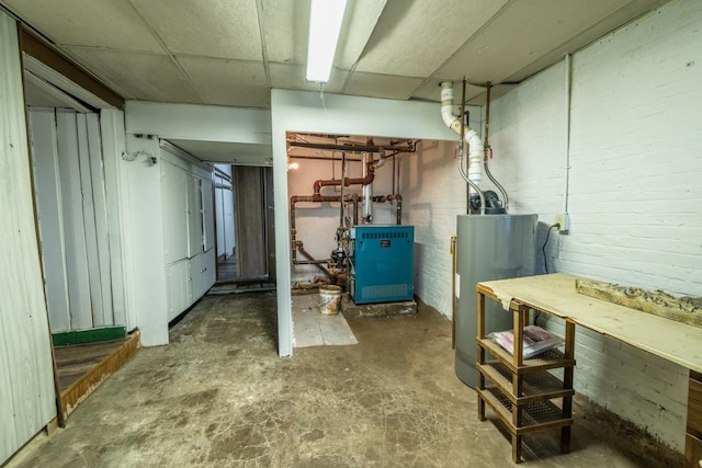 basement featuring water heater and a workshop area