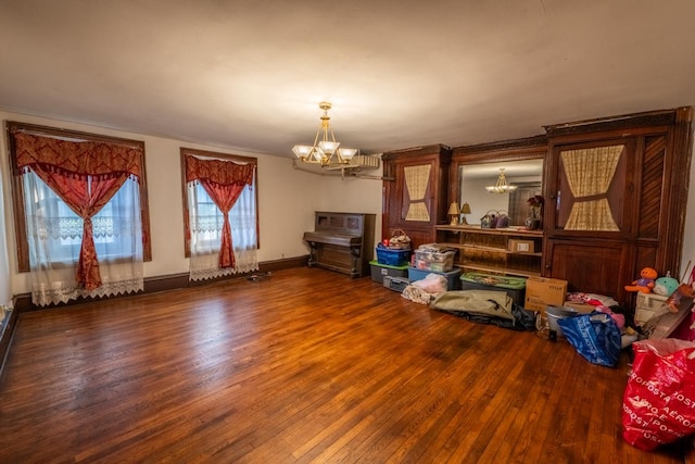 interior space featuring a chandelier and hardwood / wood-style flooring