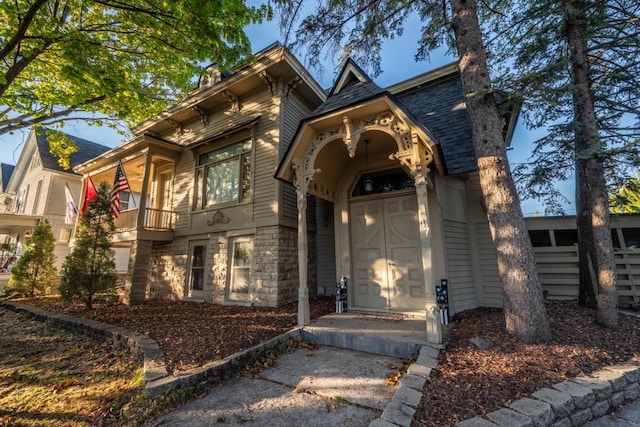 view of front of home with a balcony