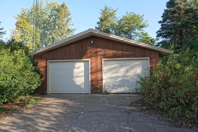 garage with wood walls