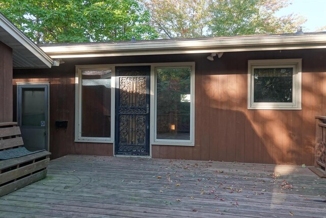 doorway to property featuring a deck