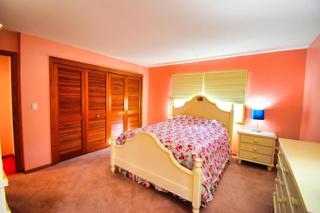 carpeted bedroom with a closet