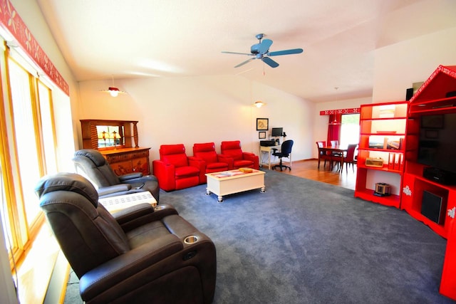 carpeted living room featuring lofted ceiling and ceiling fan