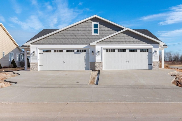 craftsman-style home featuring a garage