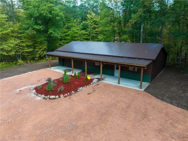 view of front of property with a carport