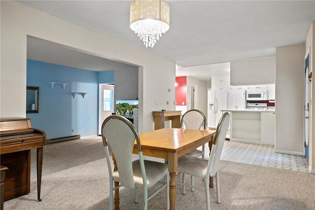 carpeted dining space with a notable chandelier, a textured ceiling, and a baseboard radiator