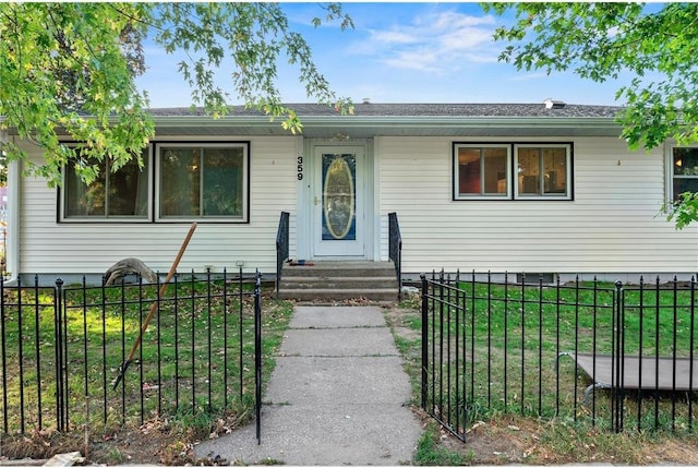 view of front facade with a front yard