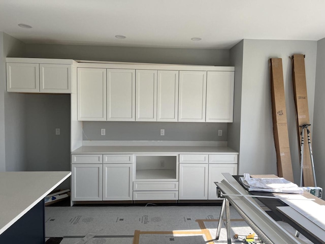 kitchen featuring white cabinetry