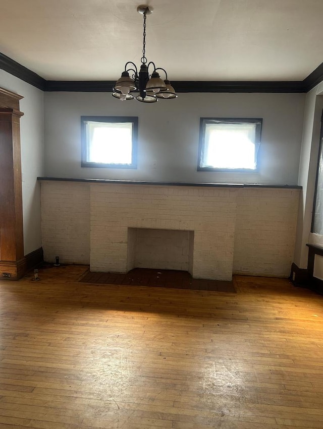 empty room with light wood-type flooring and a wealth of natural light