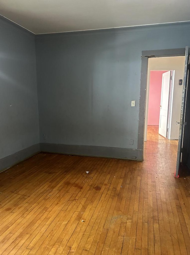 unfurnished room featuring light hardwood / wood-style floors