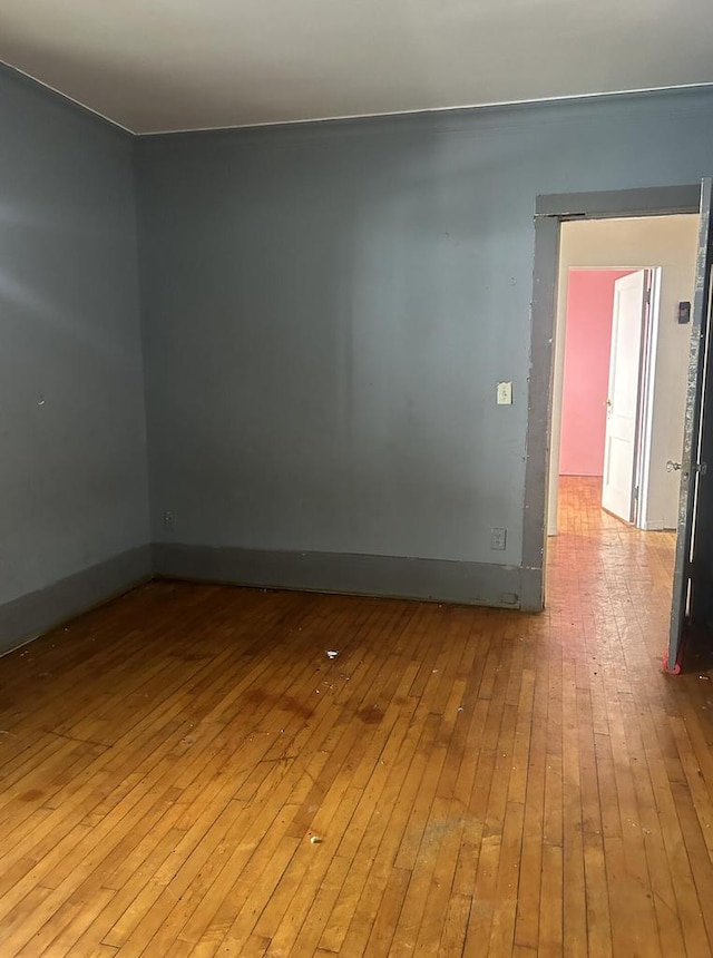 spare room featuring light hardwood / wood-style floors