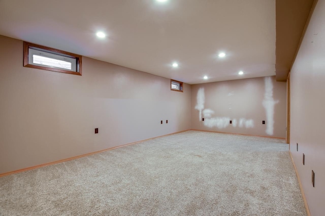 basement featuring carpet flooring