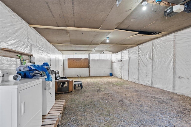 basement with washing machine and clothes dryer