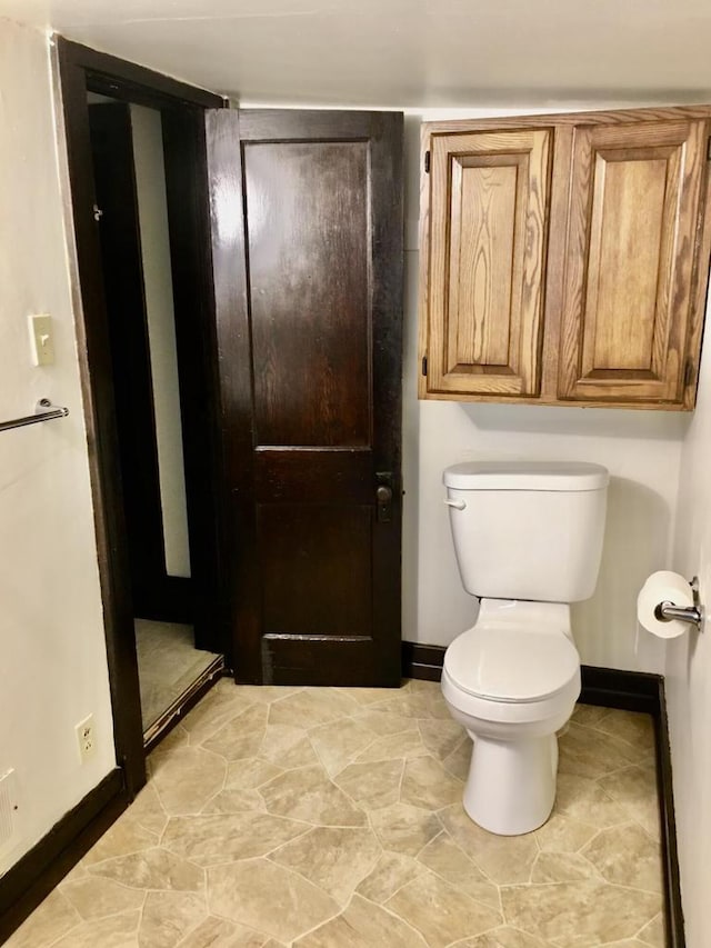 bathroom featuring toilet