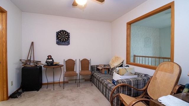 sitting room with light carpet and ceiling fan