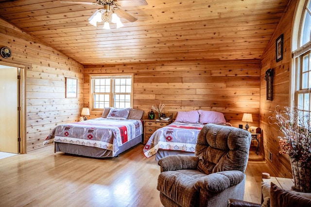 bedroom with wooden ceiling, wood-type flooring, vaulted ceiling, and ceiling fan