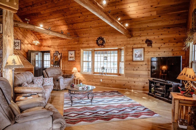 living room featuring light wood-type flooring, wood walls, beamed ceiling, and wooden ceiling