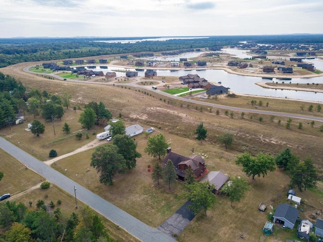 aerial view with a water view and a rural view