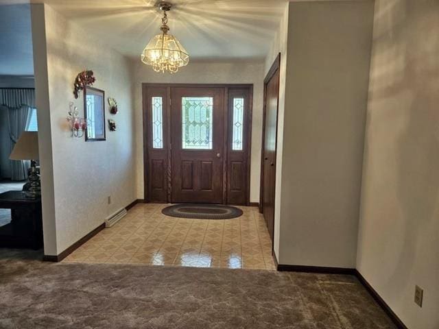 entryway with an inviting chandelier and light tile patterned flooring