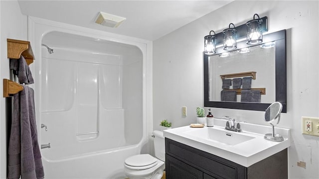 full bathroom featuring shower / bathtub combination, vanity, and toilet