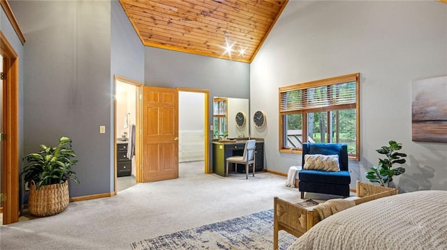 carpeted bedroom with wood ceiling and high vaulted ceiling