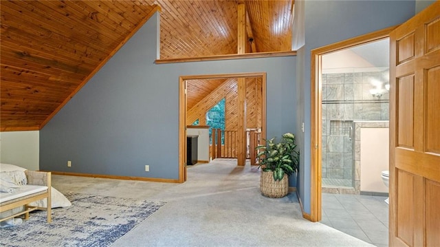 bonus room featuring wooden ceiling, vaulted ceiling, and light carpet