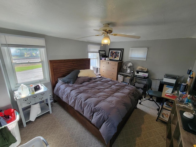 bedroom featuring carpet floors and ceiling fan