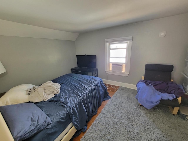 bedroom with vaulted ceiling