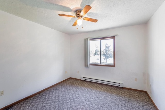 spare room with ceiling fan, a textured ceiling, baseboard heating, and carpet