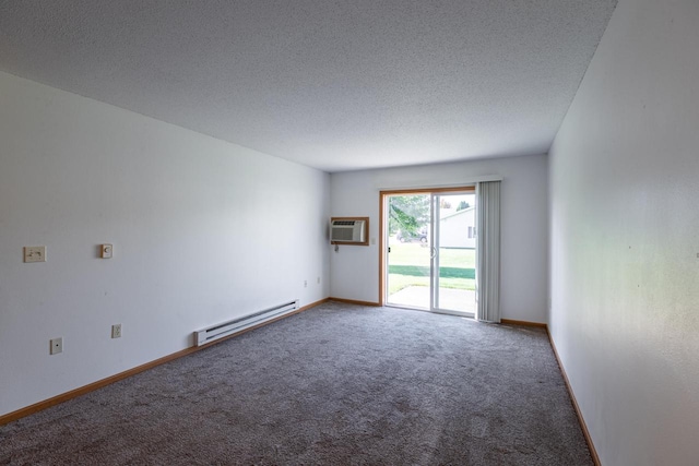 unfurnished room featuring carpet floors, a textured ceiling, baseboard heating, and a wall unit AC