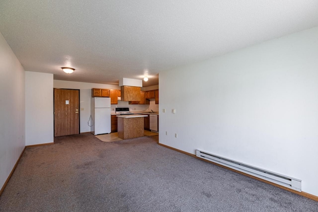 kitchen featuring white appliances, a kitchen island, baseboard heating, a textured ceiling, and light colored carpet