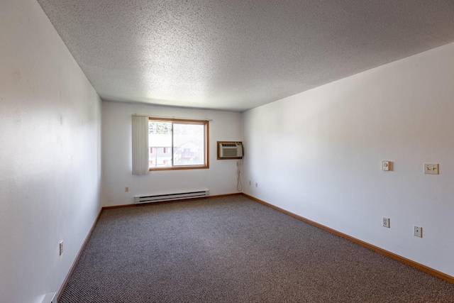 spare room with a textured ceiling, carpet, baseboard heating, and a wall mounted air conditioner