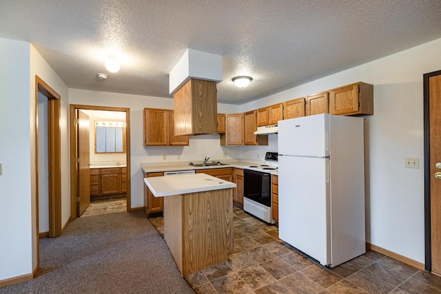 kitchen with white appliances, a kitchen island, a textured ceiling, dark colored carpet, and sink