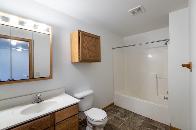 full bathroom featuring vanity, toilet, and shower / washtub combination