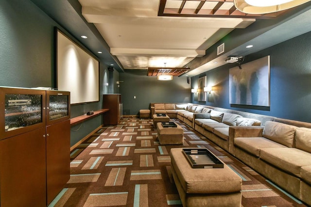 carpeted cinema with beam ceiling