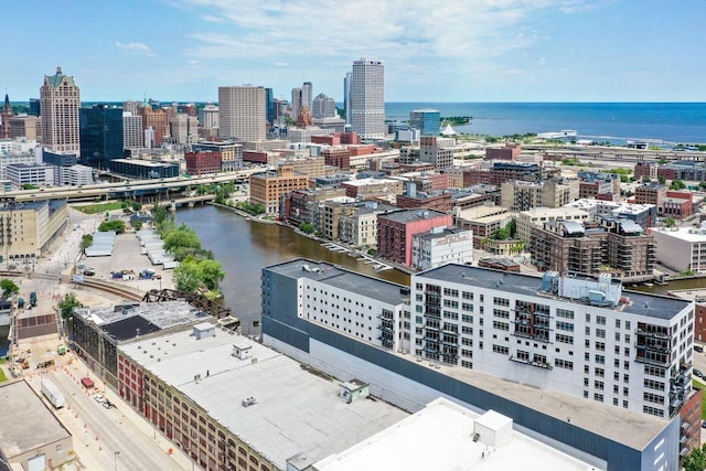 birds eye view of property featuring a water view