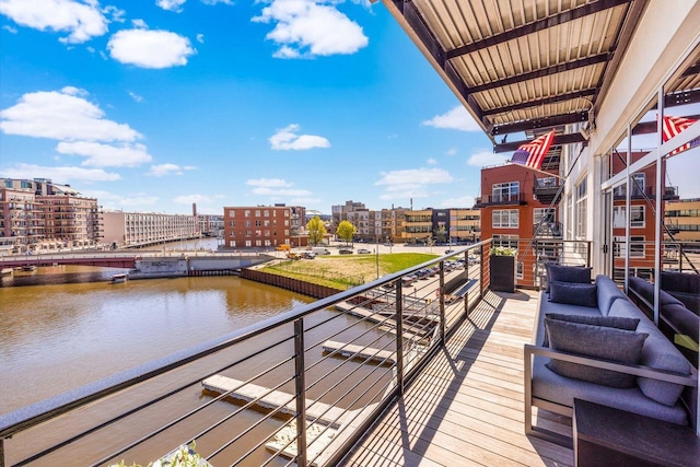 balcony featuring a water view